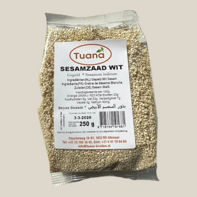 TuanaShop BV verpakking met 250g gepeld wit sesamzaad, ideaal voor salades, brood en Aziatische gerechten.