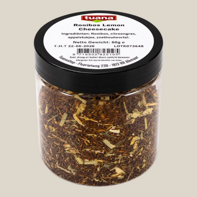 TuanaShop BV Rooibos Lemon Cheesecake thee in een transparante pot met zwarte deksel en ingrediëntenlabel