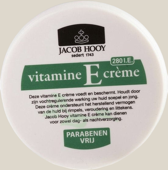 TuanaShop BV Jacob Hooy Vitamine E Crème in een witte pot van 140 ml voor dag- en nachtverzorging van de huid.