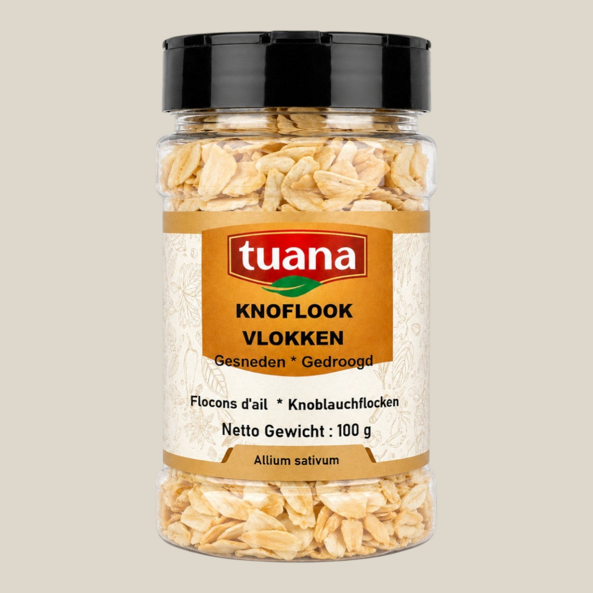 TuanaShop BV knoflook vlokken in een doorzichtige pot met zwarte dop, gedroogde knoflookstukjes voor in gerechten.