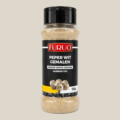 TuanaShop BV Furuo gemalen witte peper in een transparante kruidenpot van 100 gram met zwarte schroefdop.
