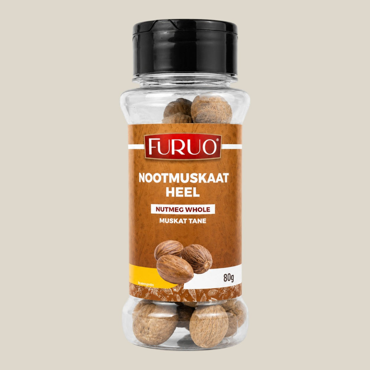 TuanaShop BV Furuo hele nootmuskaat in een doorzichtige kruidenpot van 80 gram voor vers raspen in gerechten.