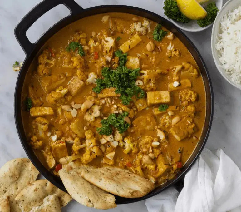 Tofu korma met geroosterde bloemkool en cashewnoten Tuana Shop