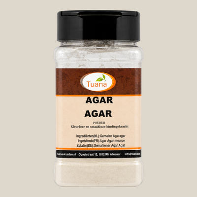 TuanaShop BV Agar Agar poeder in een doorzichtige kruidenpot met zwart deksel, natuurlijk plantaardig geleermiddel.