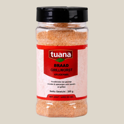 TuanaShop BV Braad- en Grill Kruidenmix in een doorzichtige kruidenpot met zwart deksel en rood etiket.
