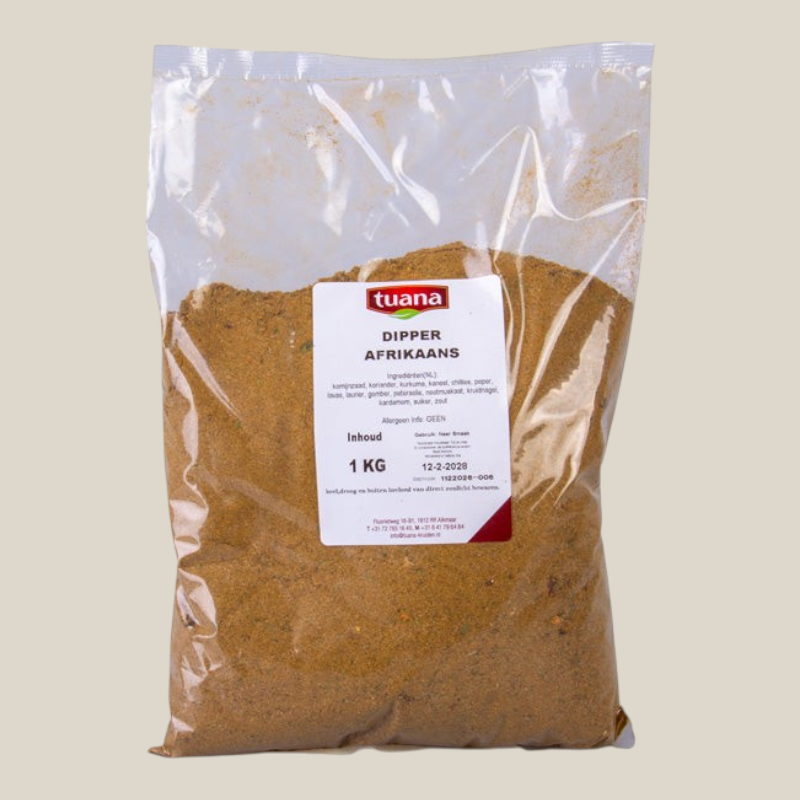 TuanaShop BV Dipper Afrikaans kruidenmix in een transparante 1 kg verpakking met etiket en warme specerijenkleur