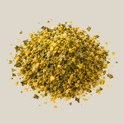 TuanaShop BV Marrakech kruidenmix met zout, een geel-groene specerijenmelange voor tajines en gegrild vlees.