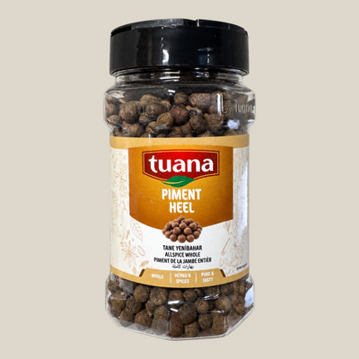 TuanaShop BV pot met hele pimentkorrels, ook wel allspice genoemd, in een doorzichtige kruidenverpakking.
