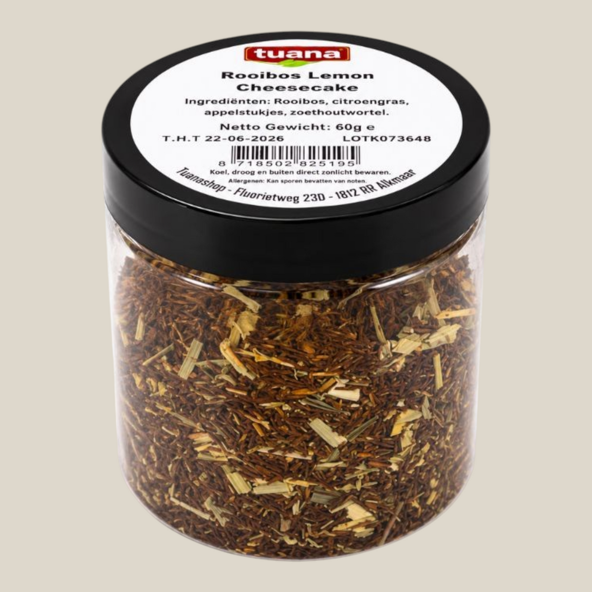TuanaShop BV Rooibos Lemon Cheesecake thee in een transparante pot met zwarte deksel en ingrediëntenlabel