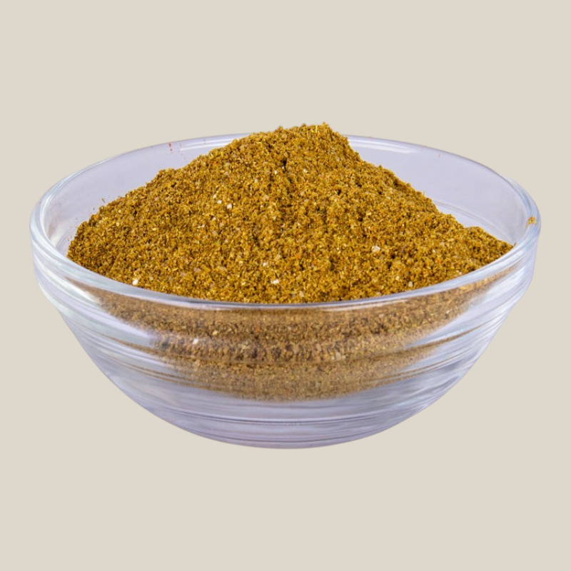 TuanaShop BV vis saus kruidenmix in een glazen kom, een aromatische blend van specerijen voor visgerechten.