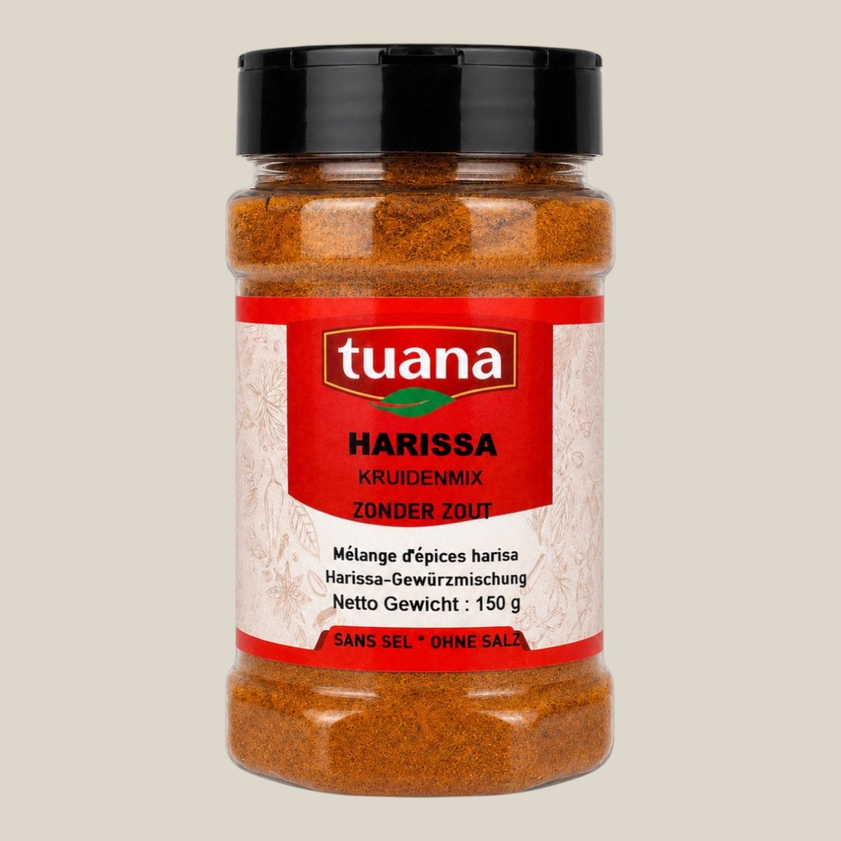 TuanaShop BV Harissa kruidenmix zonder zout in een doorzichtige pot met zwarte deksel en rood etiket
