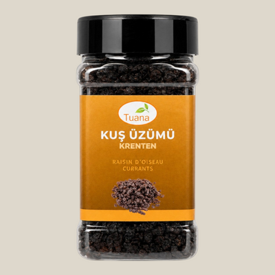 TuanaShop BV krenten of kus uzumu in een doorzichtige plastic pot met zwart deksel en oranje etiket