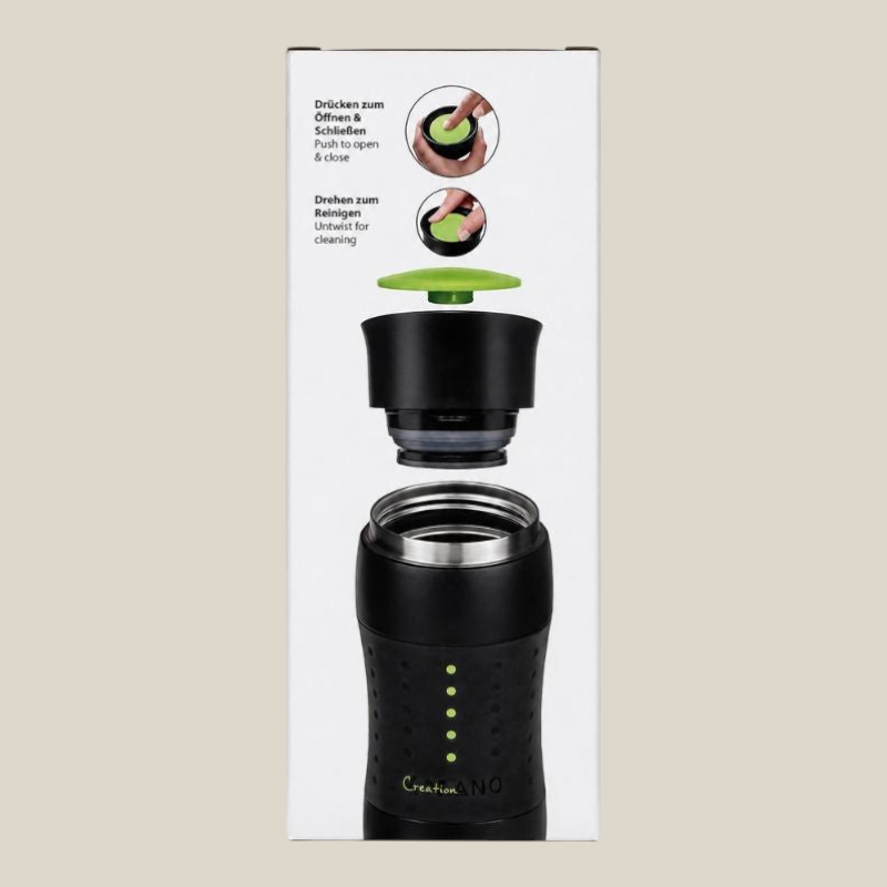 TuanaShop BV Creano travel mug in zwarte verpakking met instructies voor de 360 graden drinkopening en reiniging