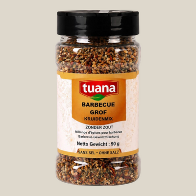 TuanaShop BV Barbecue Kruidenmix Grof in een doorzichtige kruidenpot met zwarte dop voor gegrild vlees.
