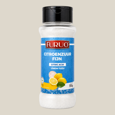 Furuo Citroenzuur Fijn in een transparante strooibus van TuanaShop BV voor gebruik in maaltijden en dranken.