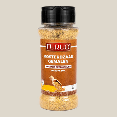 TuanaShop BV Furuo gemalen mosterdzaad in een transparante kruidenpot van 90 gram met een zwarte schroefdop.